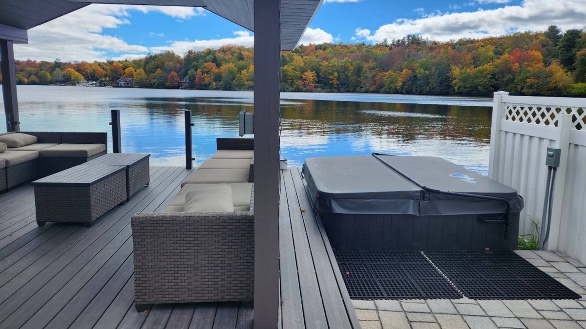 Kauneonga Lake Villa | Home king luxury, waterfront hot tub, family , indoor pool, private beach