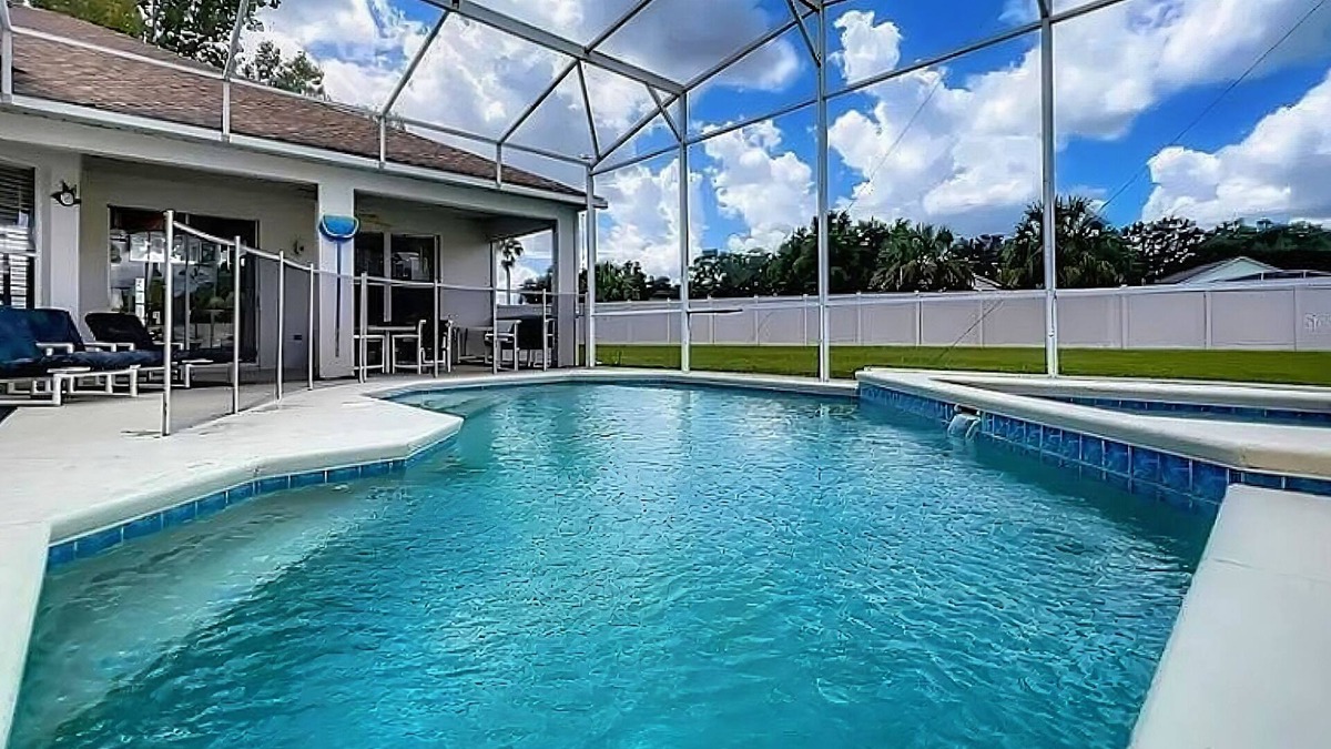 Westridge House | Home near Disney/golf with screened pool, spa, pool table, foosball, AC, & W/D