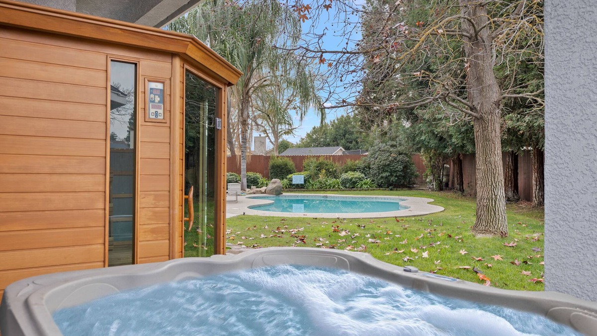 Clovis House | Home oasis with sauna, jacuzzi, pool & heated gazebo!