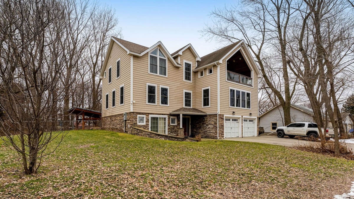 Malletts Bay House | Home on Lake Champlain with pool, hot tub, in-home gym, firepit, & lovely views