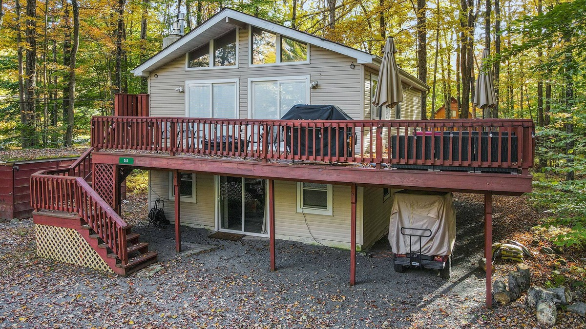 Thornhurst House | Home with a fireplace, gym, tennis, pool, beach access, game room & washer/dryer