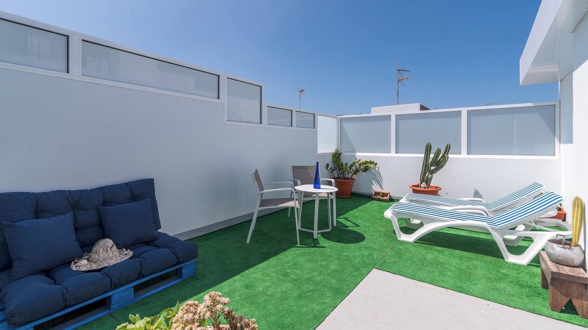 Vecindario Apartment | Home2Book Quiet Retreat with Patio & Roof Access