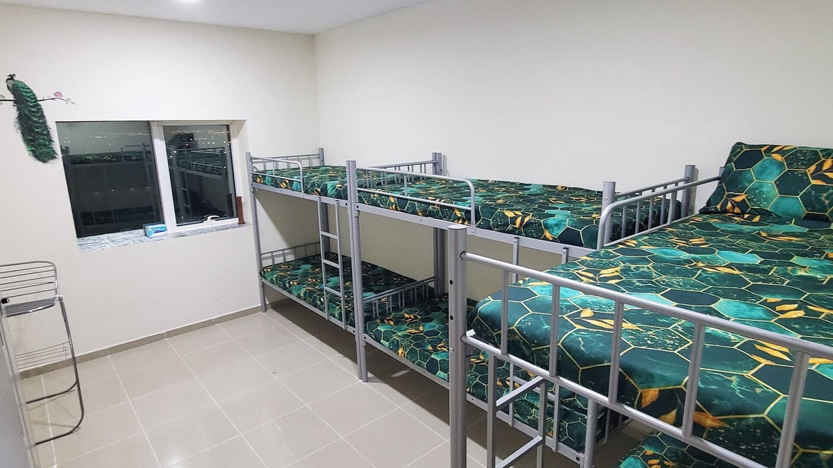 Sharjah Apartment | Homely Hostel - Spacious and clean bedspace in prime location on Al Wahda Street