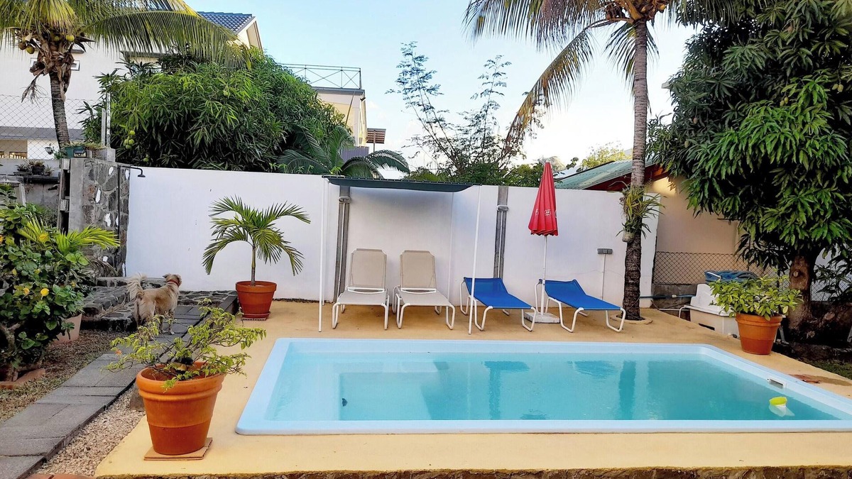 Flic-en-Flac Apartment | Homerez - Apt in Flic en Flac with Pool