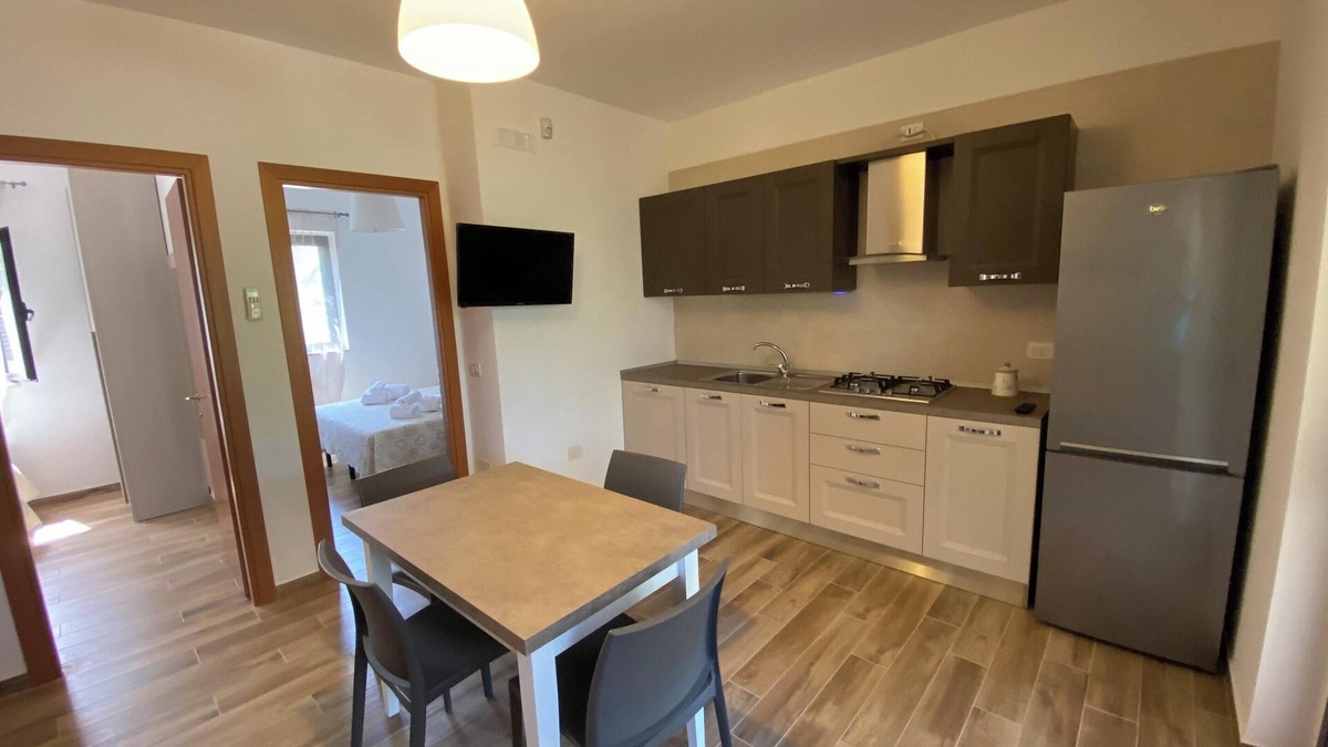 Chiesiola Apartment | Homerez - Charming Apartment in Vieste with Shared Pool and Garden