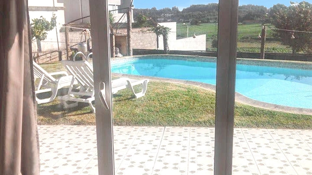 Vila Nova de Famalicao House | Homerez - Charming House in Requião with Shared Pool