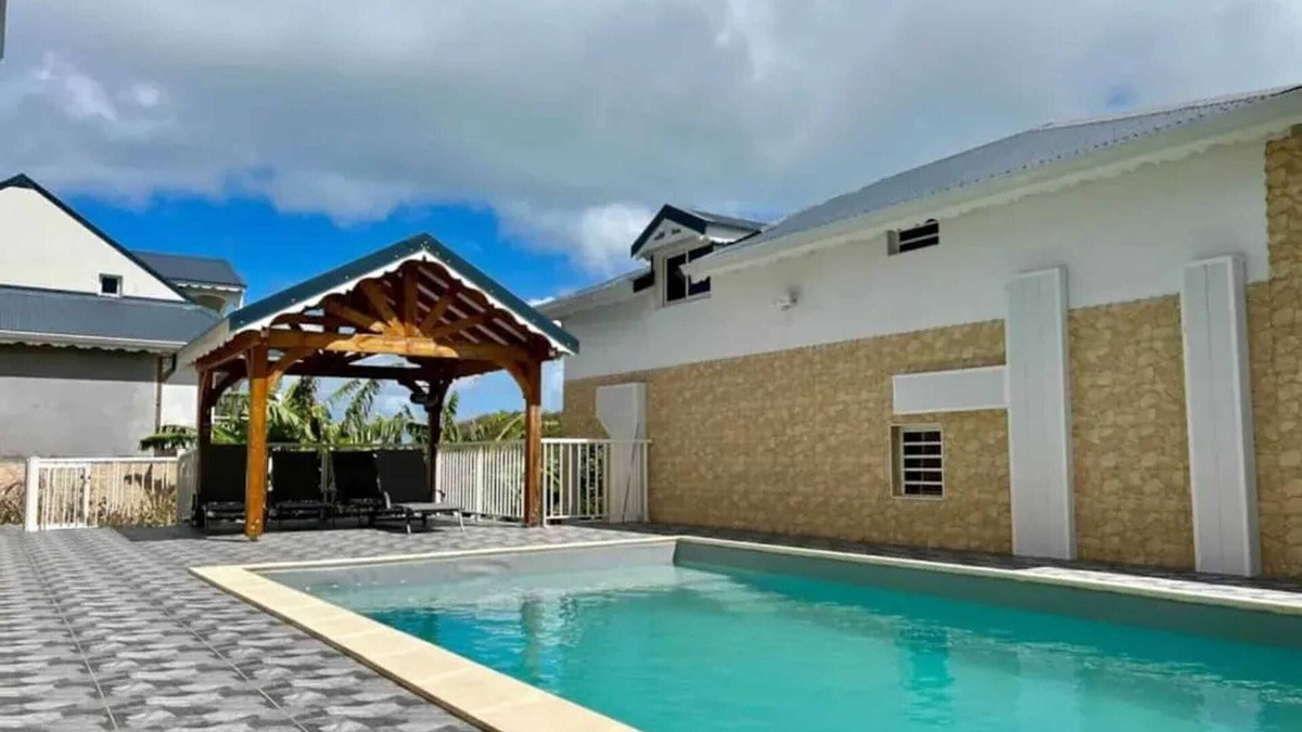 Bas Vent House | Homerez - Family House in Deshaies with Shared Pool