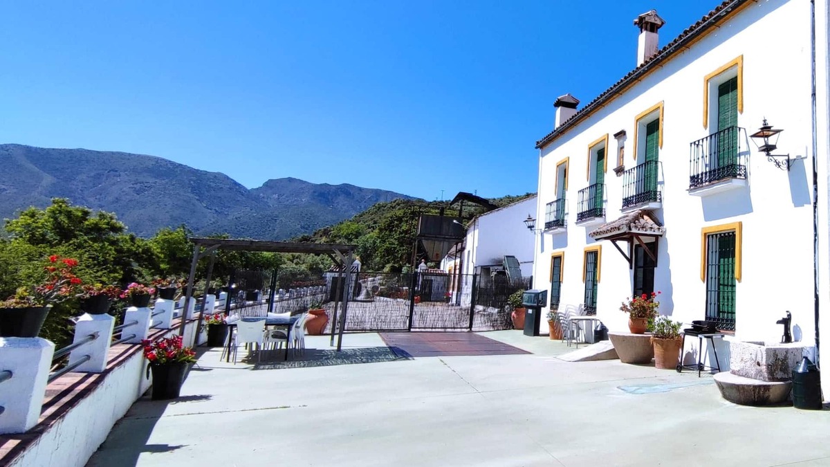 Zahara de la Sierra House | Homerez - House for 12 ppl. with shared pool and garden at Zahara de la Sierra