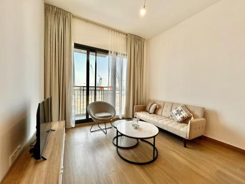 Dubai Apartment | Homes2Retreat - Modern Comforts 1 BR in Liva Lush Living