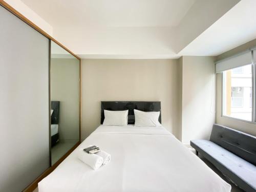 Duren Sawit Apartment | Homey and Cozy Stay Studio Gateway Park LRT City Jatibening Apartment By Travelio
