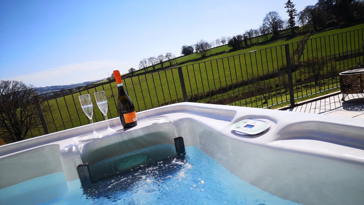 Tiverton House | Hot tub amazing views. Spa treatments available