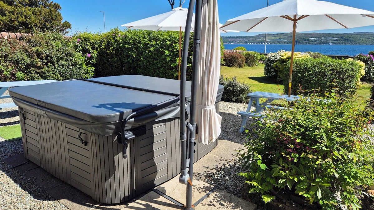 Kilmun House | Hot tub. Water views. Sleeps 12. A perfect base to explore Argyll. Pet friendly.