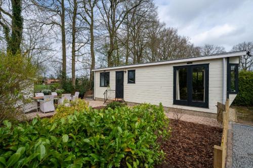 Epe Ski Chalet | Hotel chique chalet met zicht over de weilanden op de Veluwe