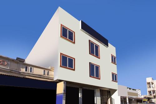 Rau Hotel | Hotel O Manjulam Regency