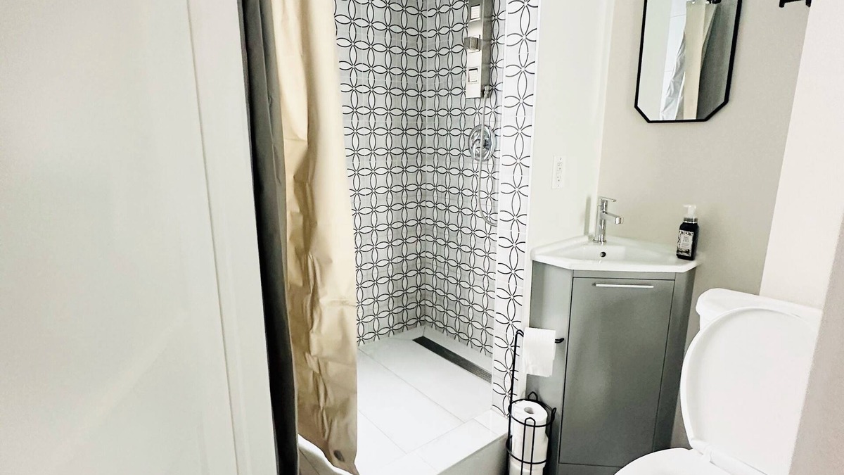 Guelph House | Hotel style private main level if townhome