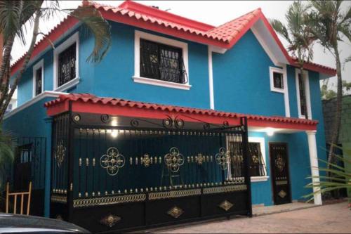 Ensanche Isabelita House | House-Blue-Mary