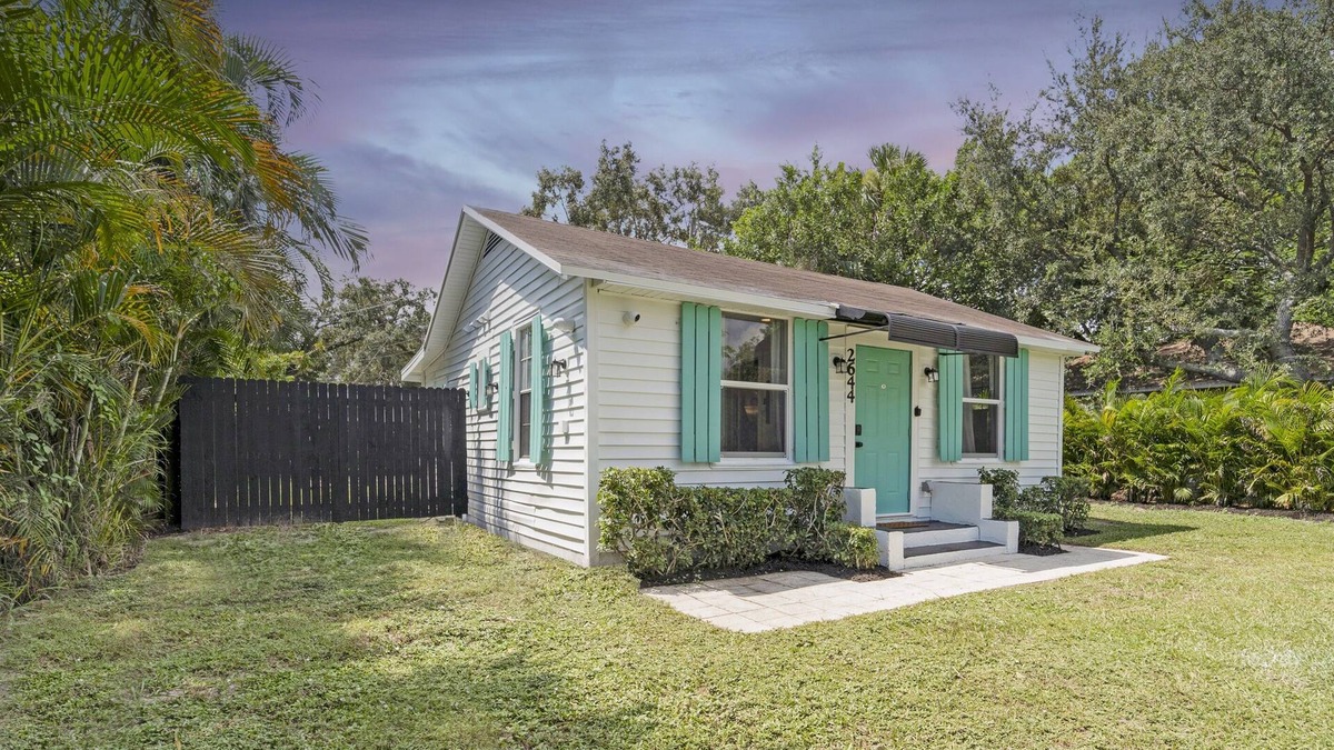 Westgate House | House with Fenced Yard - Palm Wave Says -