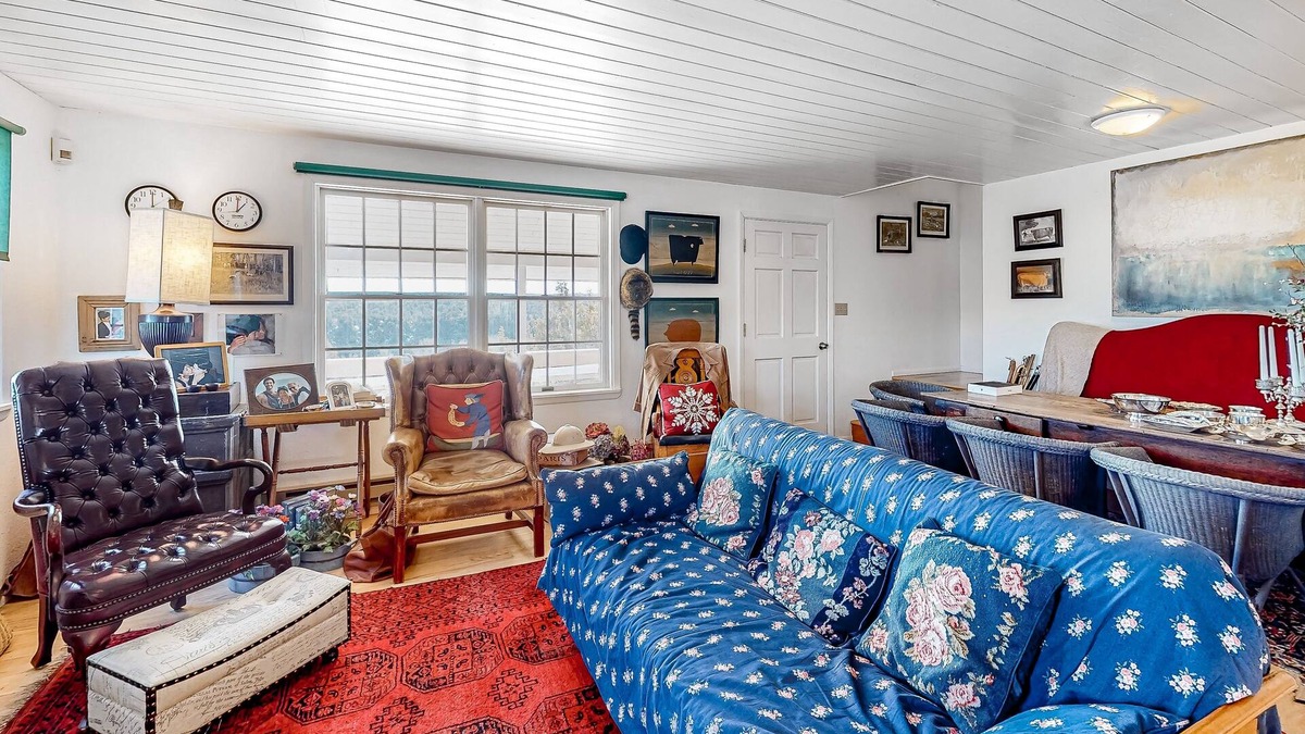 Marvel House | Idyllic rural home with private pond, river access, pool, patio, & covered decks