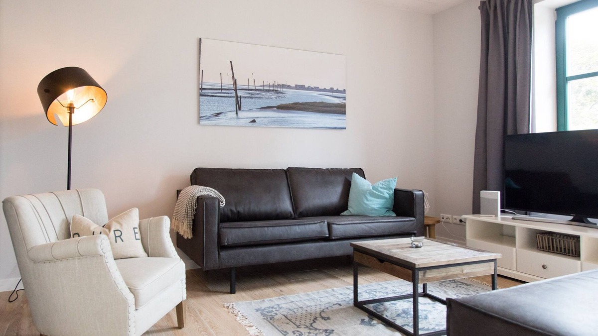 Dornum Apartment | "Idyllic vacation apartment in Neßmersiel - your retreat on the coast!"