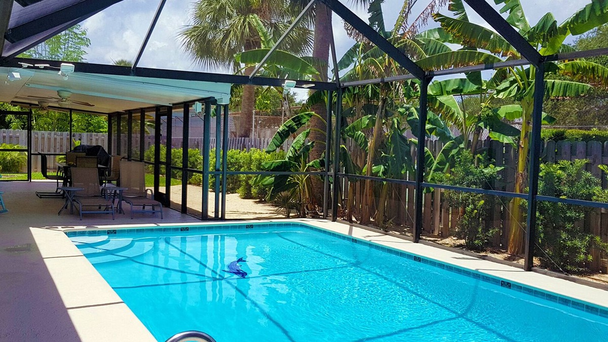 South Patrick Shores House | Immaculate beach house with amenities and heated pool - 5 min bike ride to beach