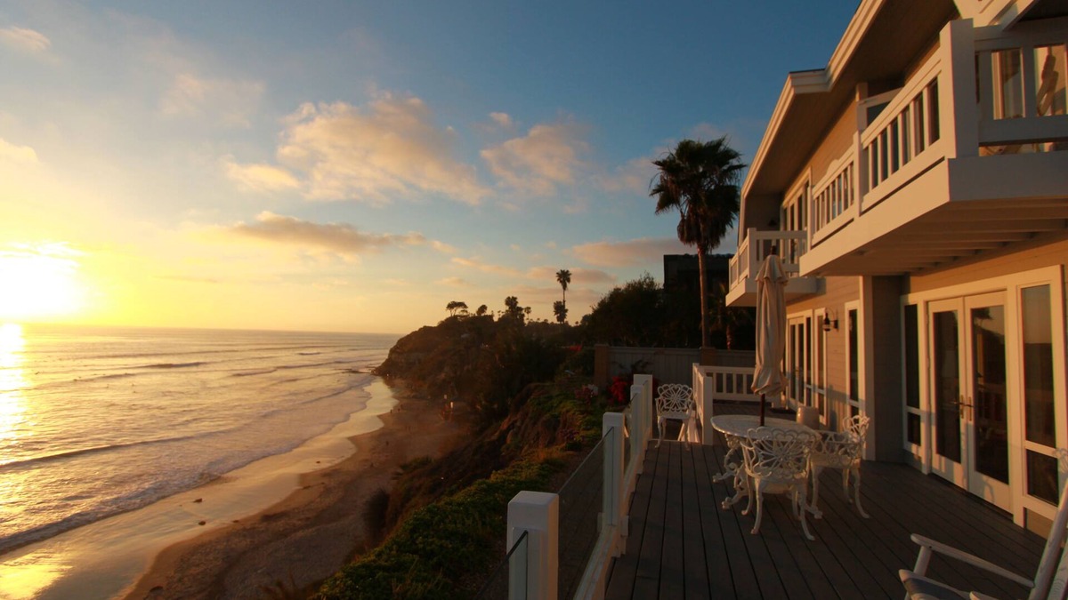 Encinitas House | Impeccable Cape Cod Oceanfront Home Overlooking Swami's Beach.