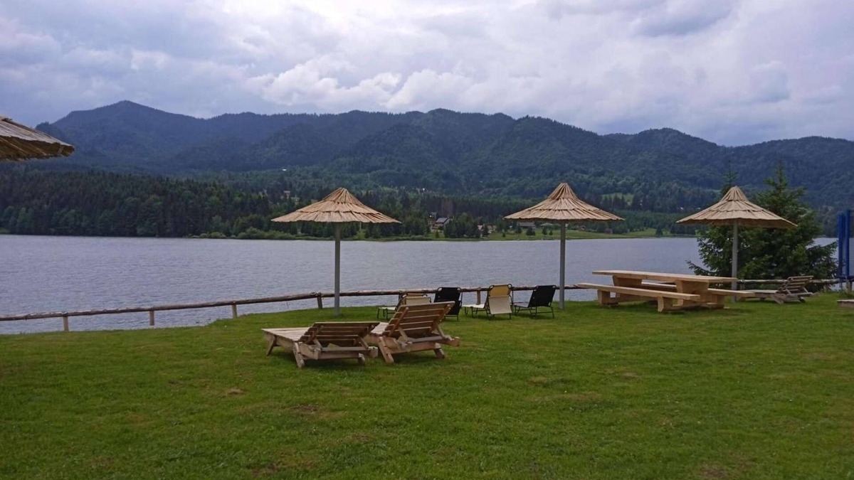 Colibita Apartment | Incredible room with lake view at Lake Colibita, next to the lake.