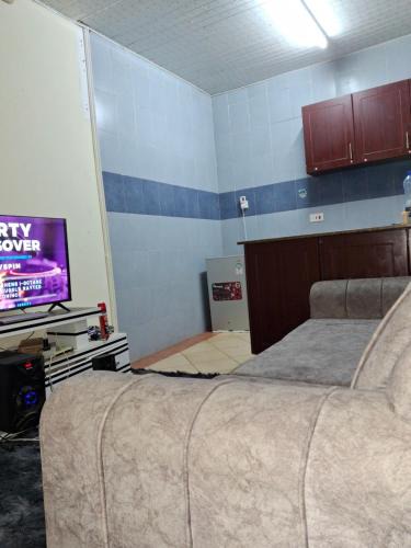 Manyimbo House | Indian ocean apartments you get the master bedroom with the private bathroom and the host sleeps in the other bedroom you share kitchen anc living room