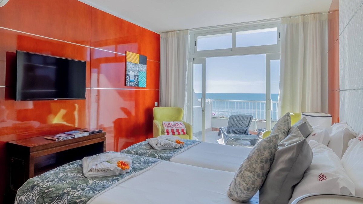 Oura Hotel | Indulge in Home-Like Comfort! Three Relaxing Suites, Pool, Beachfront Property!