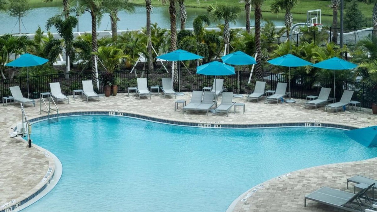 Port Canaveral Hotel | Indulge in Home Like Comfort! Pool, Kitchenette, Free Breakfast, Parking!