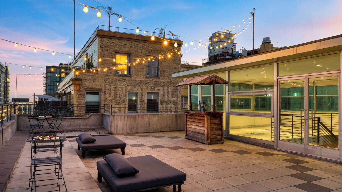 Historic Core House | Industrial-Chic DTLA Loft with Rooftop & City Views | Skyline Lofts by AvantStay