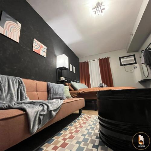 Las Pinas Apartment | Industrial Chic with Pool, Netflix, and Games in Las Pinas