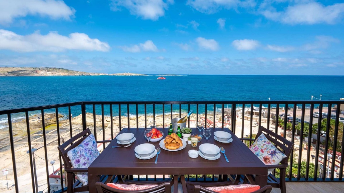 Qawra Apartment | Islet Promenade Seafront Apartment with large Corner Terrace