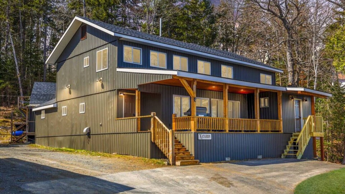 Northeast Somerset Cabin | Katahdin - Cabin 4 · Lawrence's Lakeside Cabins | 'Katahdin': Boat Dock + Kayaks