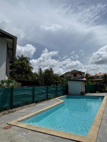 Cayenne Apartment | Kaz'Baduel piscine, terrasse et jacuzzi privatif, wifi et climatisation