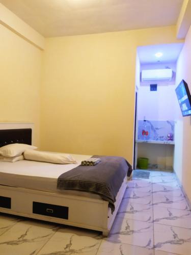 Kotamobagu Hotel | KB HOMESTAY Mongkonai