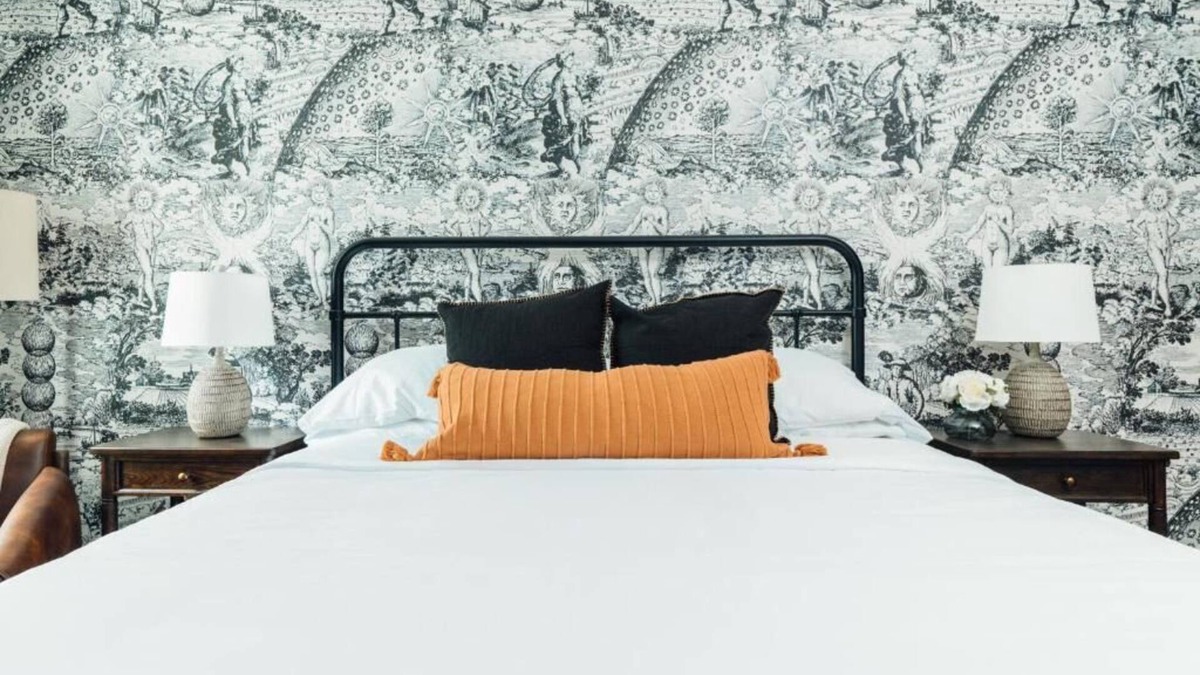 Five Points South Hotel | King Room at The Painted Lady! Pet-Friendly, Free Parking! Near Regions Field!