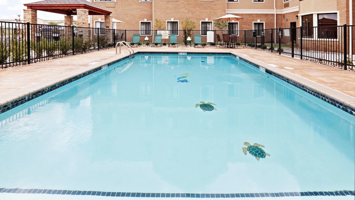 Oklahoma City Condo | King Suite. Free Breakfast. Outdoor Pool, Gym, Business Center.