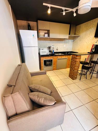 Xangri-La Apartment | Kitnet Centro Atlântida Sul