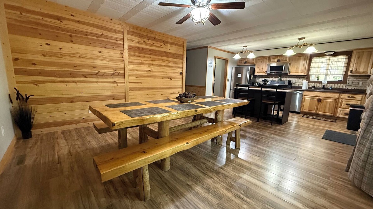 Prudenville Cabin | Knotty by Nature! Firepit and Parking! Less than a mile to trails and the lake!