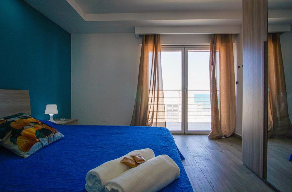 Agnone Bagni Apartment | Laguna Blu Apartment - Panoramic View, Very close to the beach