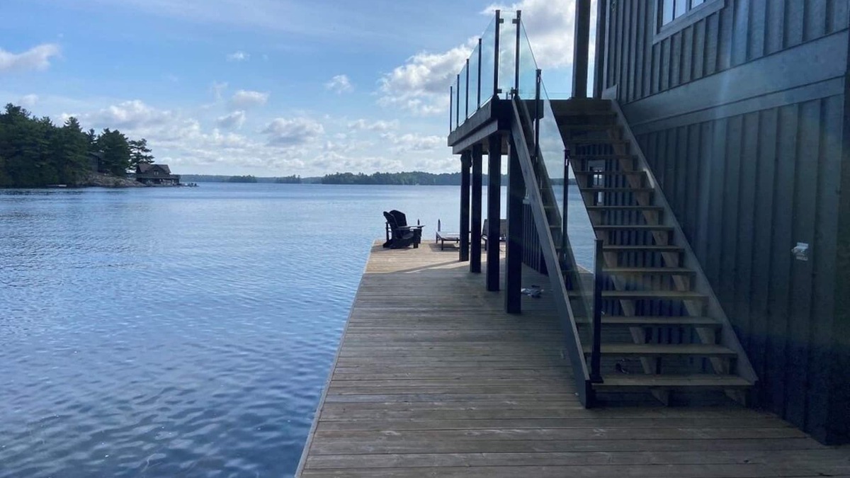 Muskoka Lakes Cottage | Lake Joseph Luxury Rental with 2-story Boathouse. Tennis & Pickleball Optional.