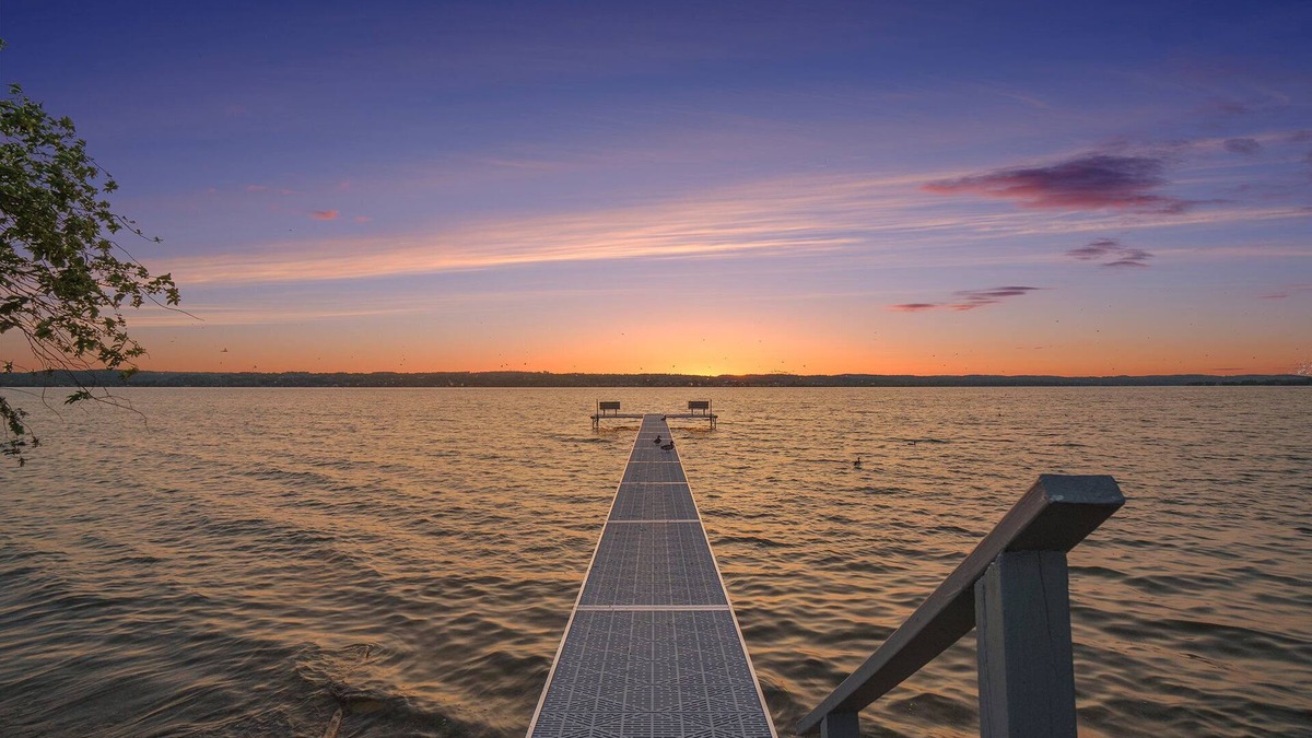 Traverse City Cottage | Lake Leelanau Cottage with Stunning Sun Set Views. 10 Miles from TC!