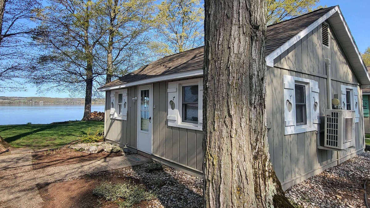 Traverse City Cottage | Lake Leelanau Waterfront Cottage with Mini Harbor - Close to Traverse City!