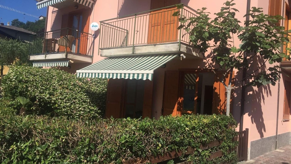 Sala Comacina Apartment | Lake View. Beautiful three-room apartment with garden and pool. Lake Como.