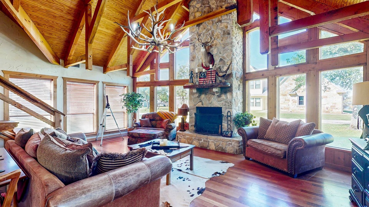 Lake Whitney House | Lake view home with expansive yard, lovely porch & nearby lake access