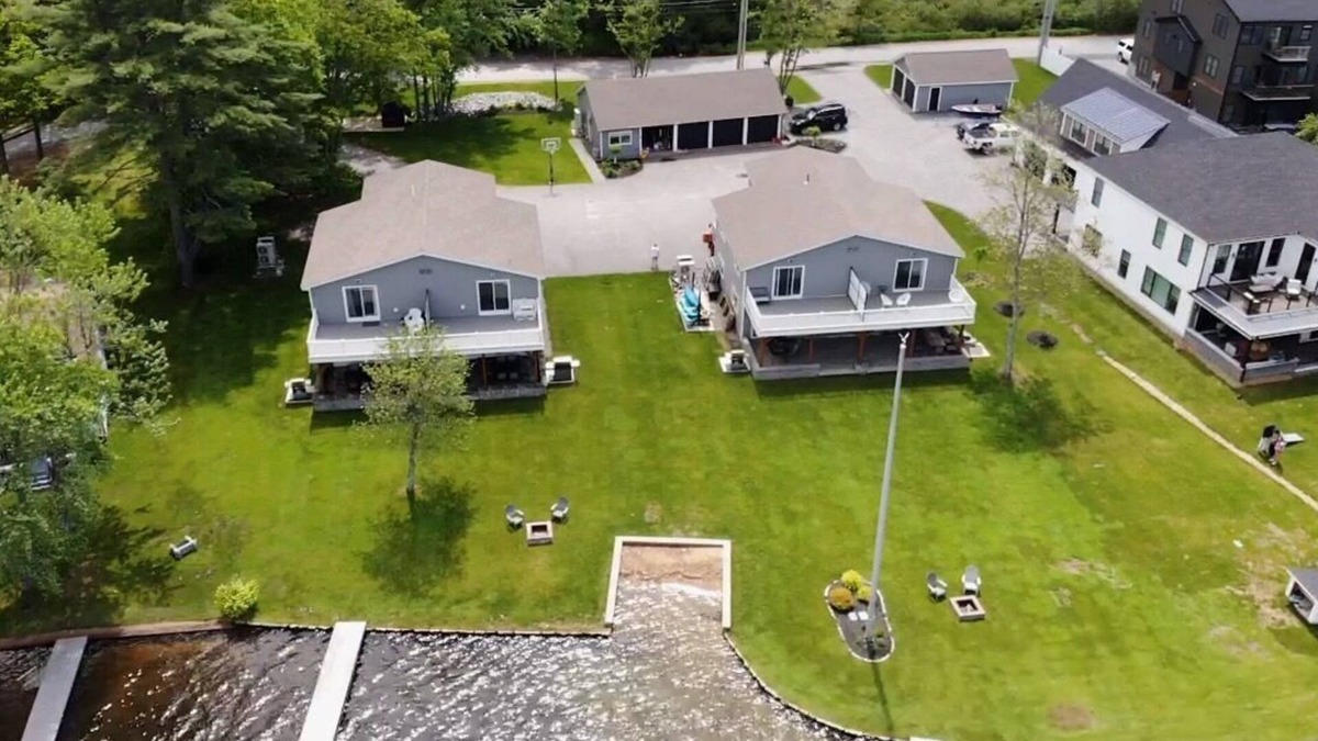 Lochmere House | Lakefront 3-bedroom Duplex on Lake Winnisquam, docks, Beach, WiFi, AC.nB2B