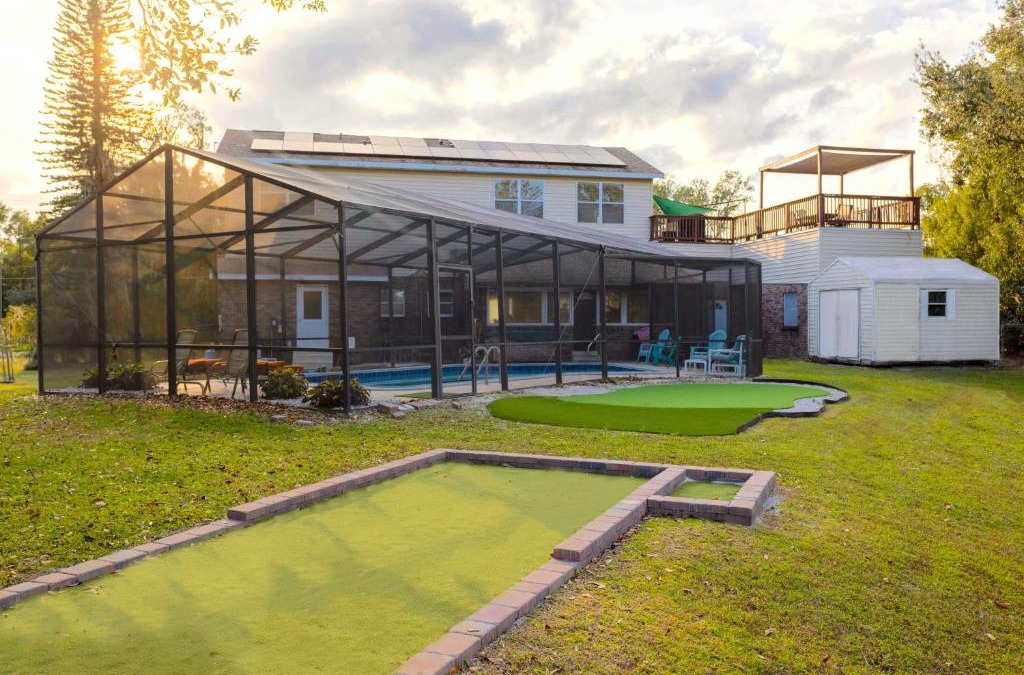 Edgewood House | Lakefront 7 Bedroom Duplex, Pool, Boat, and Hottub