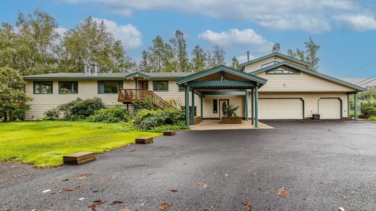 Sand Lake House | Lakefront Anchorage home with fireplaces, jetted tub & private dock