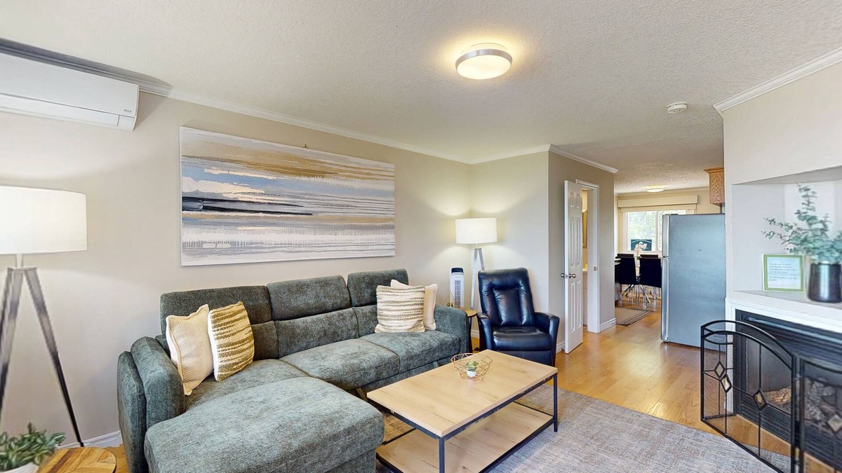 Wasaga Beach House | Lakefront condo steps to the beach with pool, and fireplace