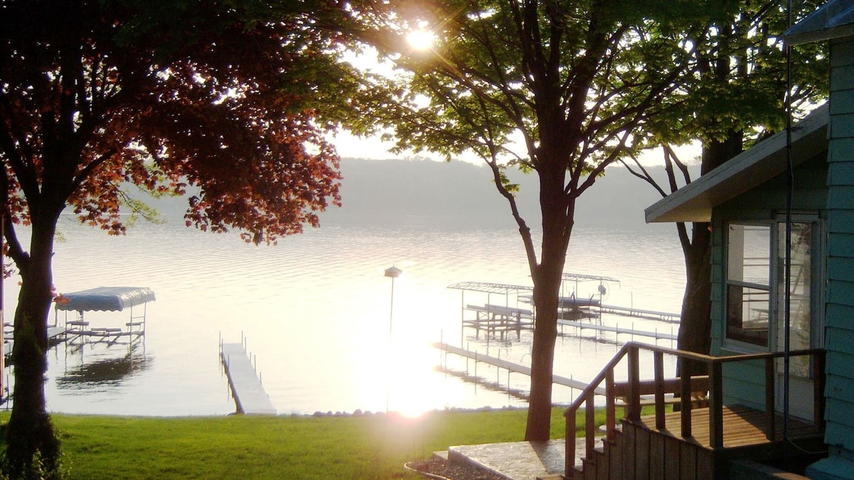 Angola Cottage | Lakefront cottage on first basin of Lake James. Dock, sandy bottom, great sunset